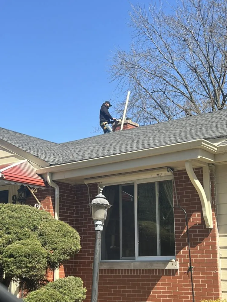 Slide of Lucas Brothers Roofing & Tuckpointing