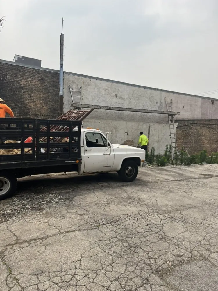 Slide of Lucas Brothers Roofing & Tuckpointing