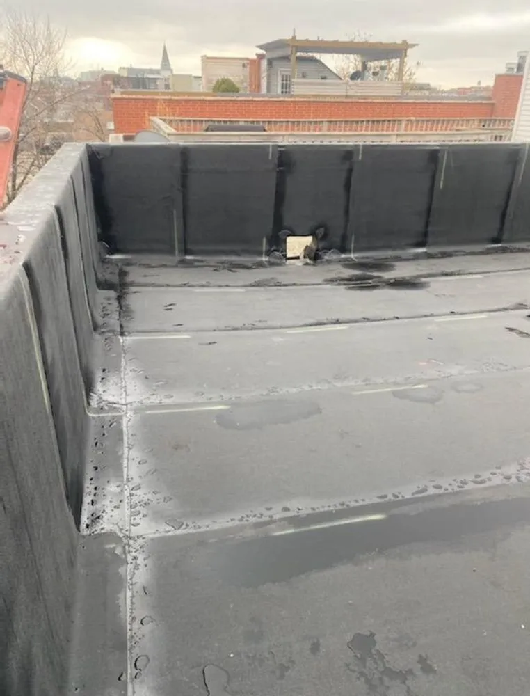 Slide of Lucas Brothers Roofing & Tuckpointing