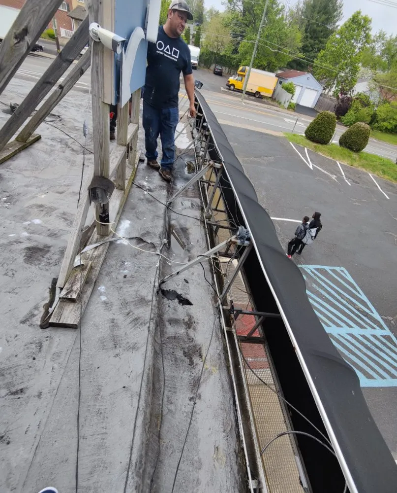 Slide of Lucero’s Roofing