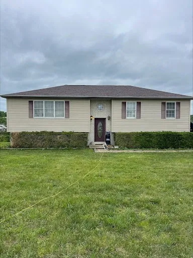 Slide of Ludlow's Roofing