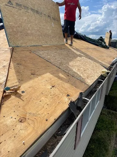 Slide of Ludlow's Roofing