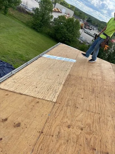 Slide of Ludlow's Roofing