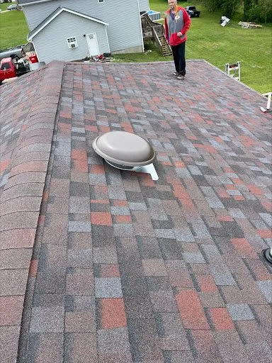 Slide of Ludlow's Roofing