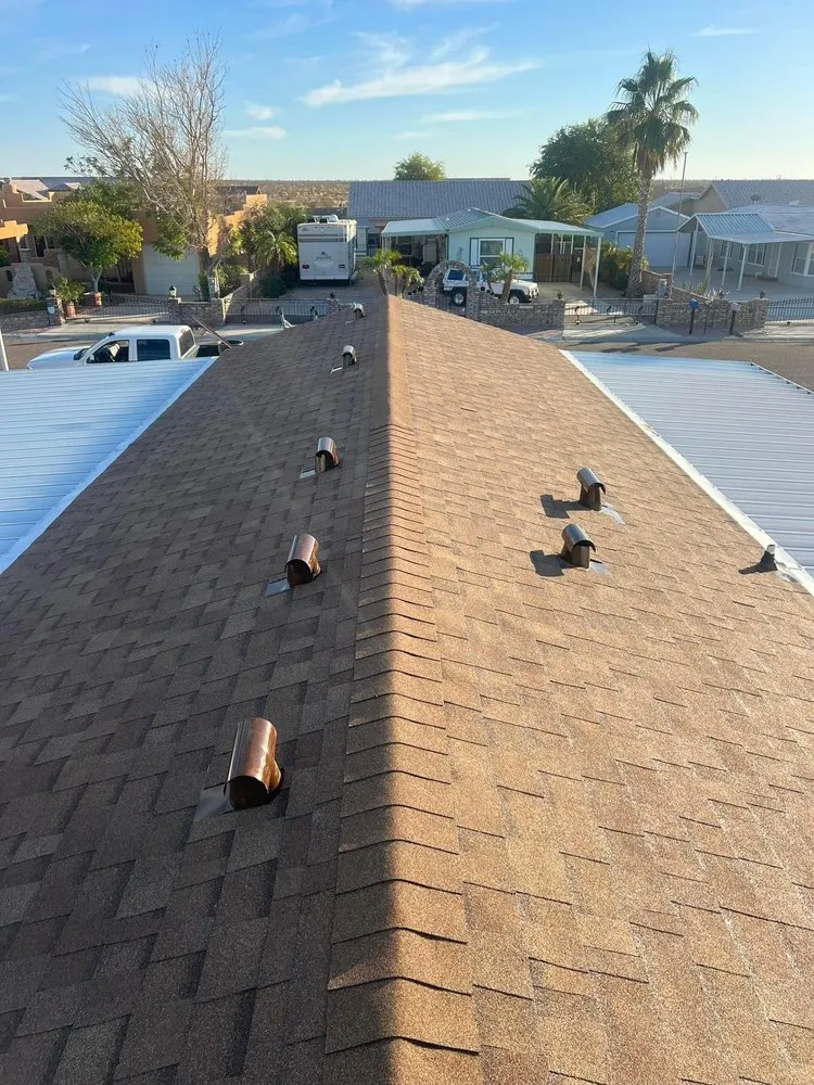 Slide of Lugo's Roofing Services