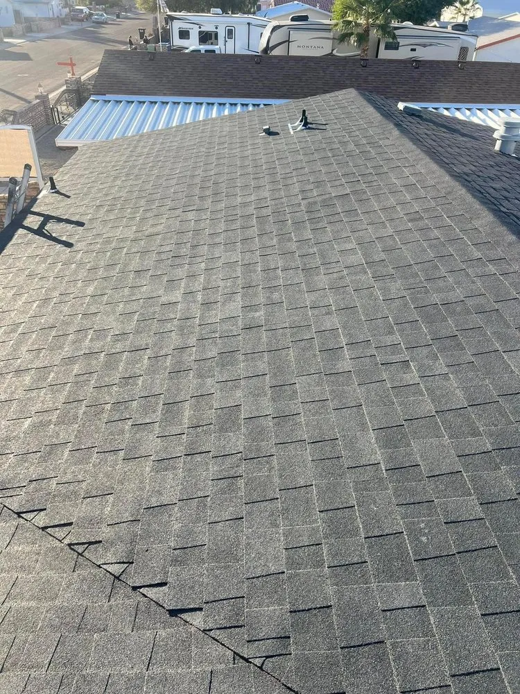 Slide of Lugo's Roofing Services