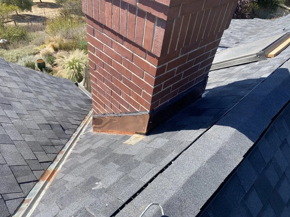 Slide of Luis Roofing