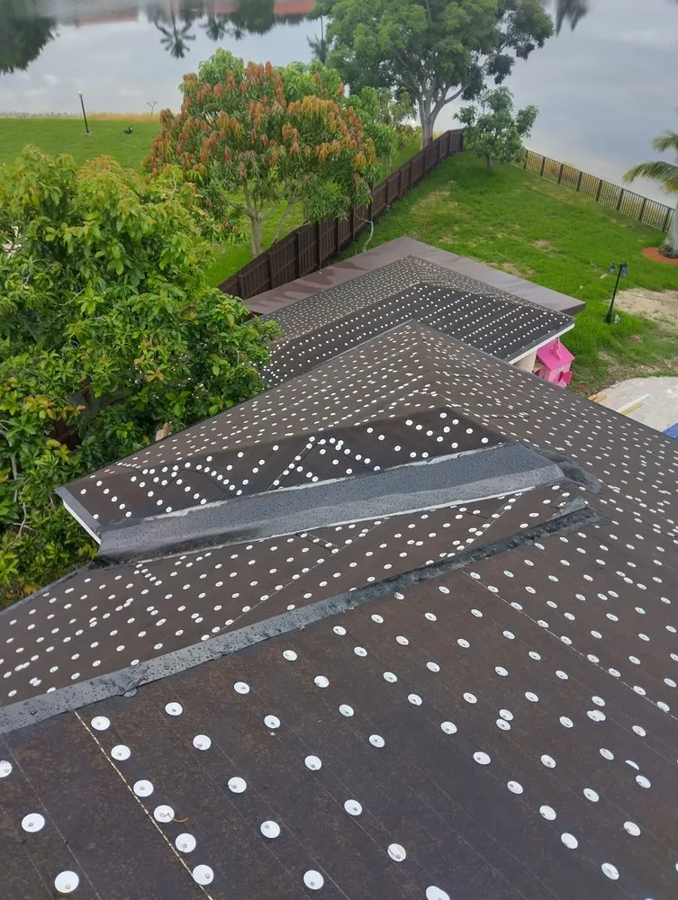 Slide of Luis Roofing Solution