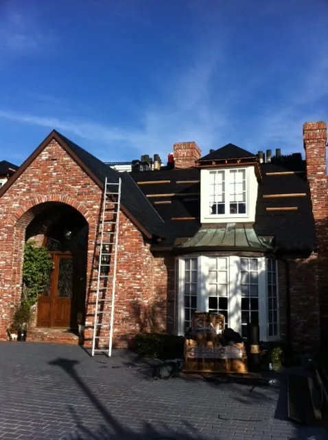 Slide of Luke Roofing