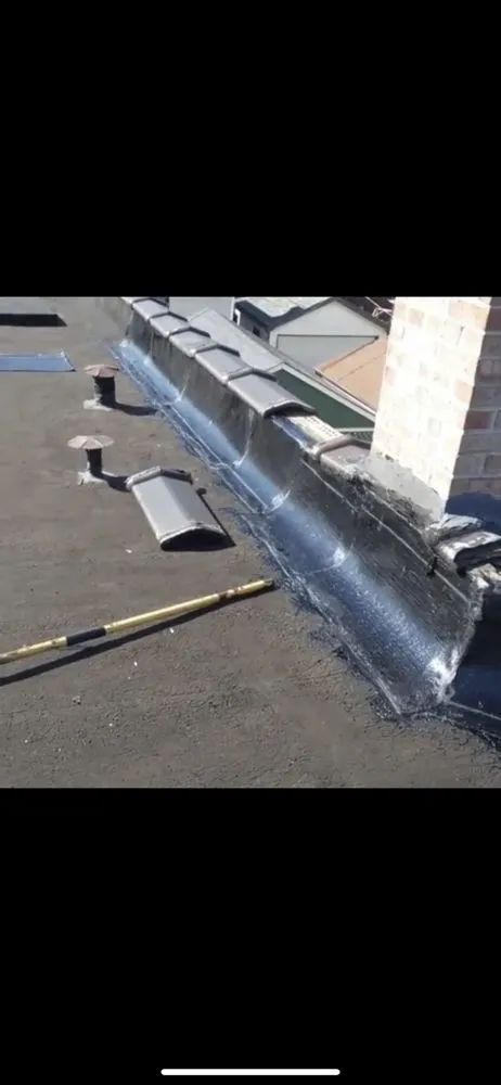 Slide of Luke's Roofing and Masonry