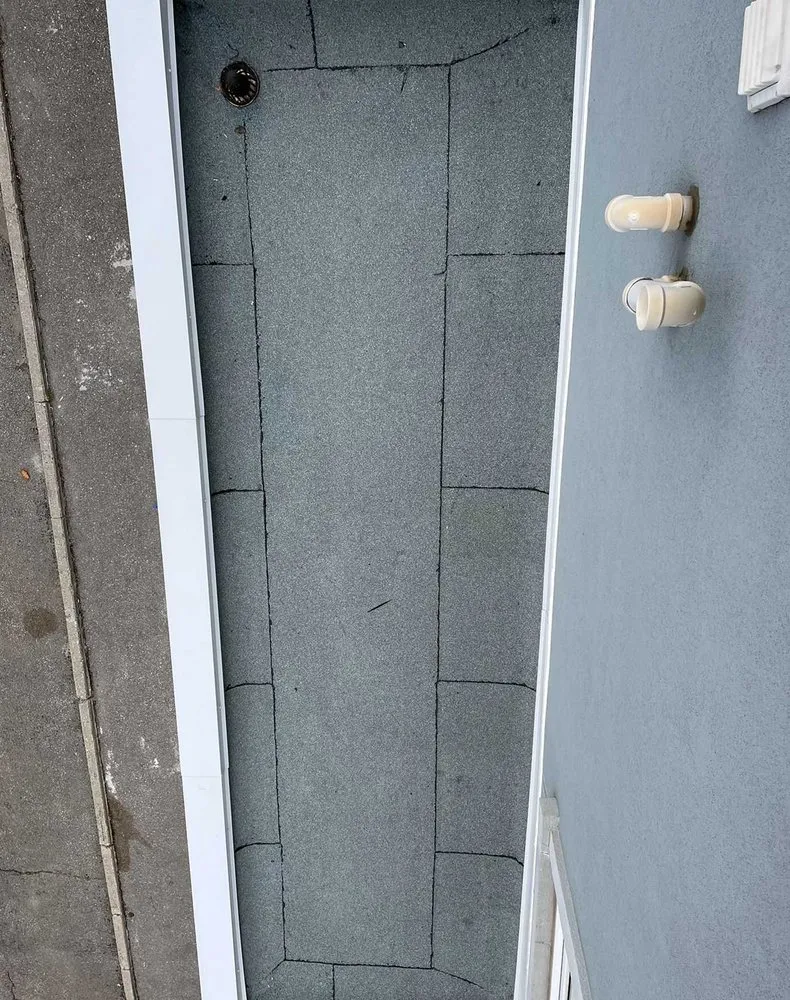 Slide of Lummus Park Roofing