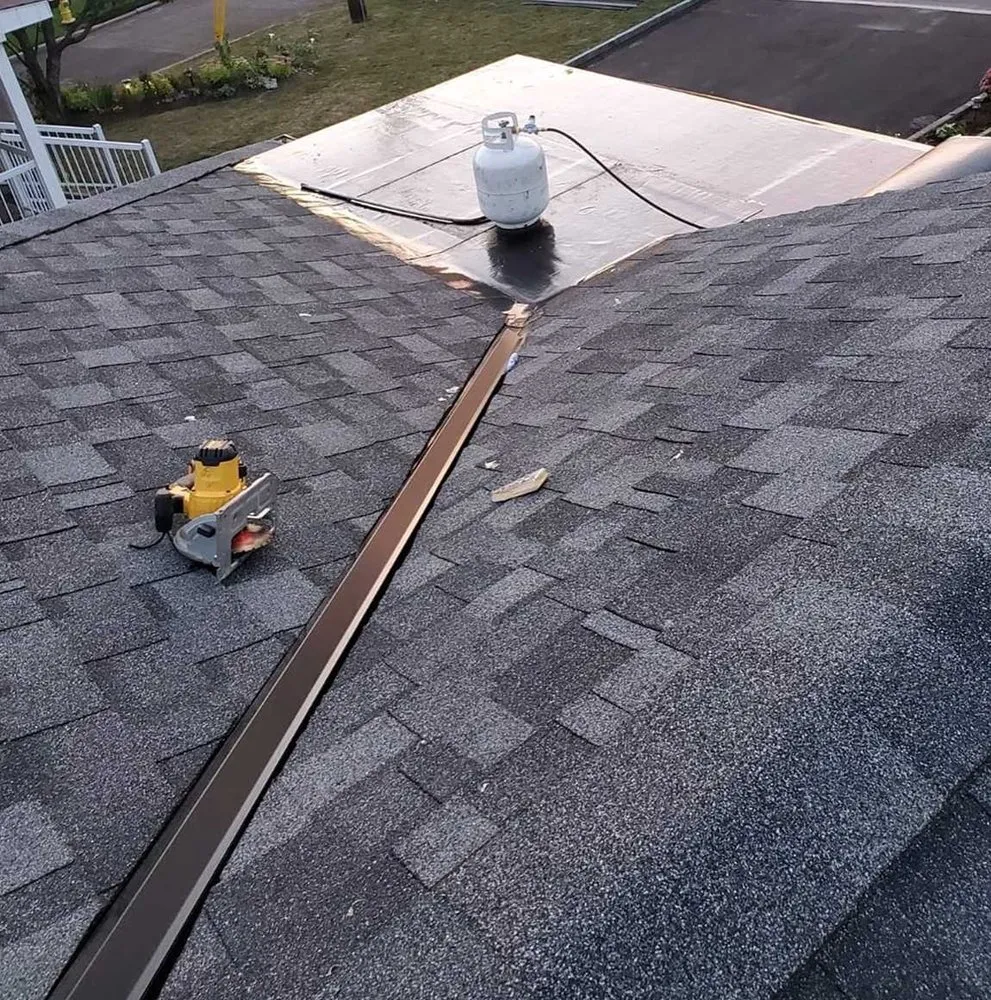 Slide of Lummus Park Roofing