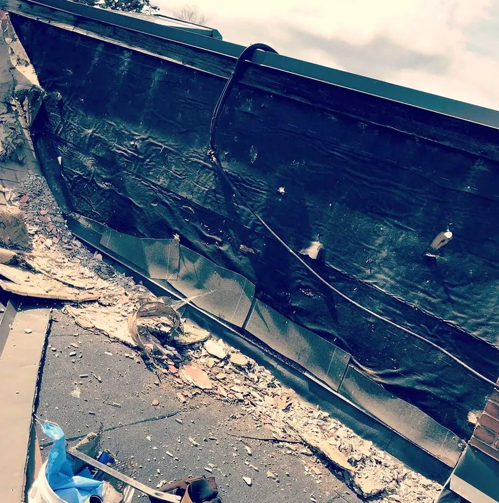 Slide of Lummus Park Roofing