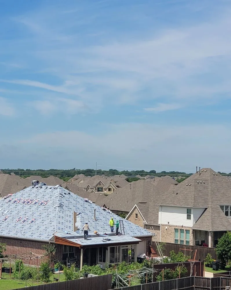 Slide of Luy's Roofing