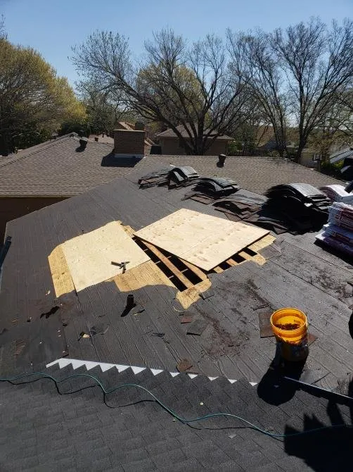 Slide of Luy's Roofing