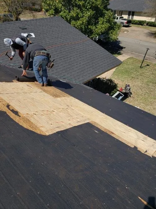 Slide of Luy's Roofing