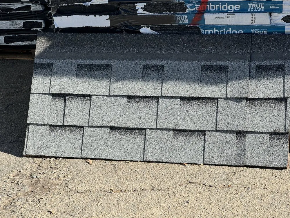 Slide of LXS Roofing