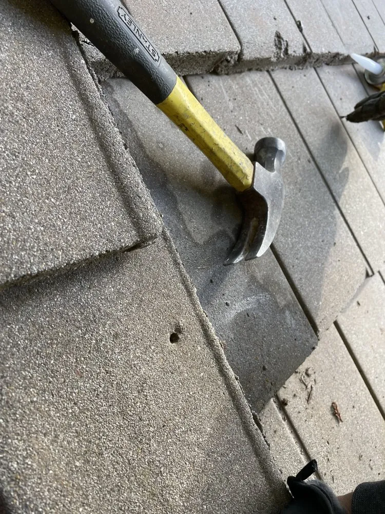 Slide of LXS Roofing