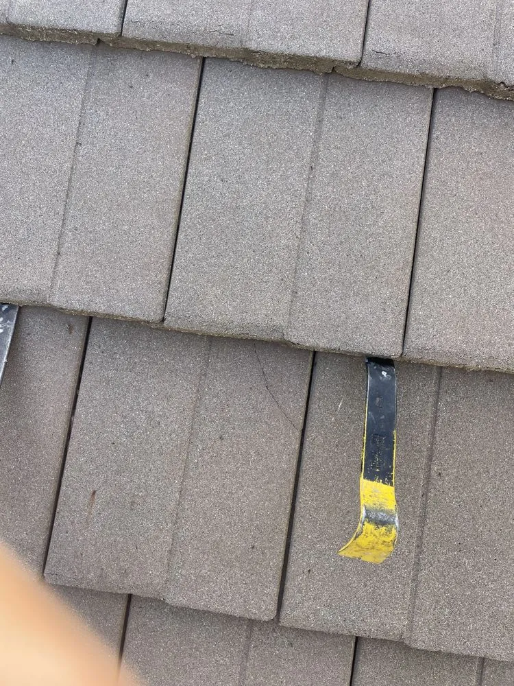 Slide of LXS Roofing