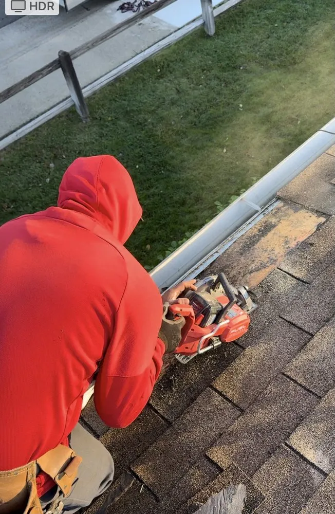 Slide of LXS Roofing