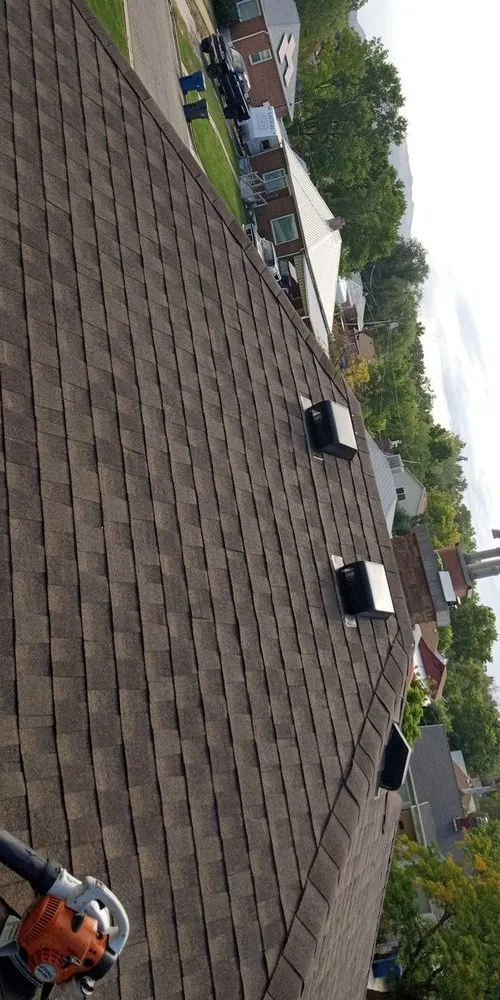 Slide of Lym all Weather Roofing