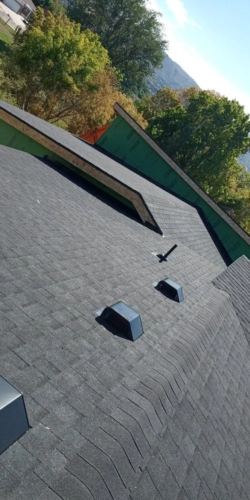 Slide of Lym all Weather Roofing