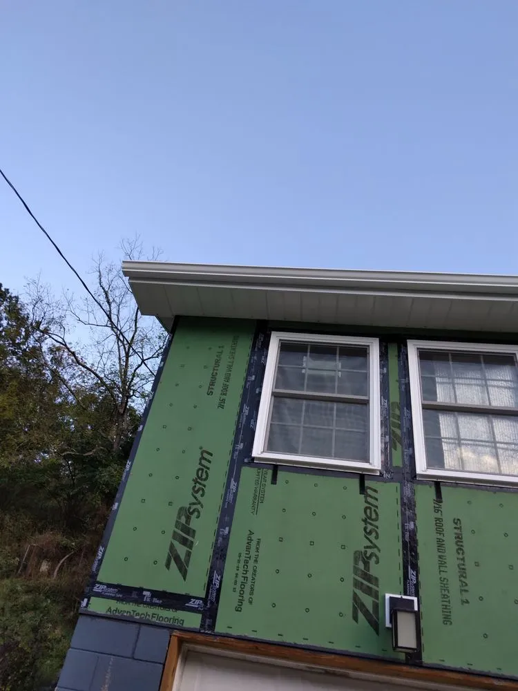 Slide of M & A Seamless Gutter Services