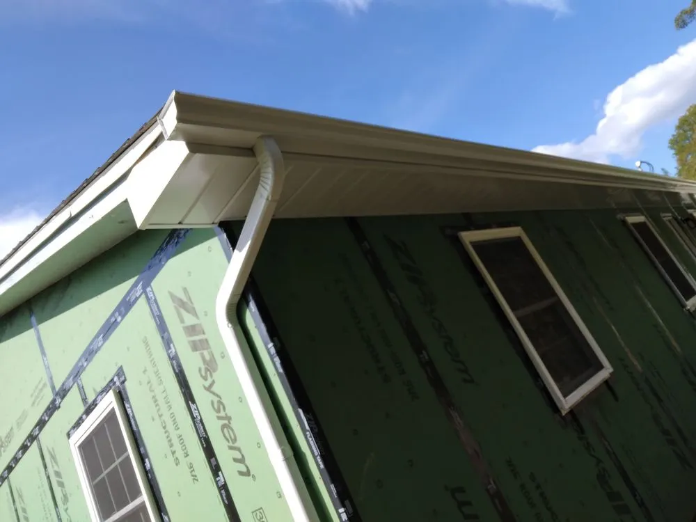 Slide of M & A Seamless Gutter Services