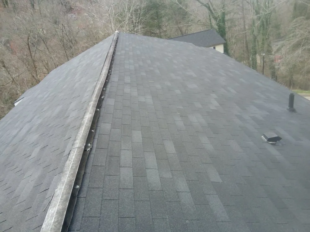 Slide of M & A Seamless Gutter Services