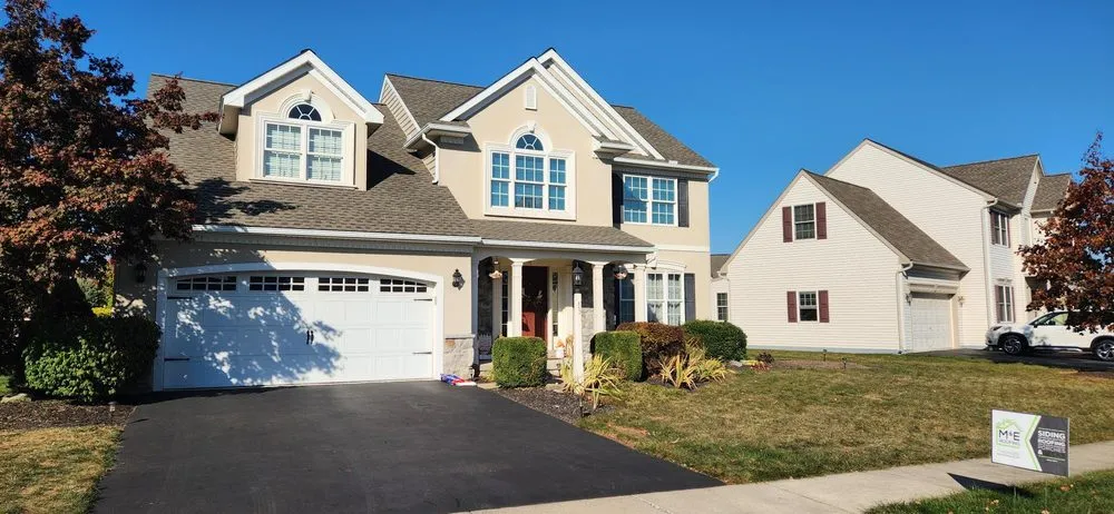 Slide of M & E Roofing