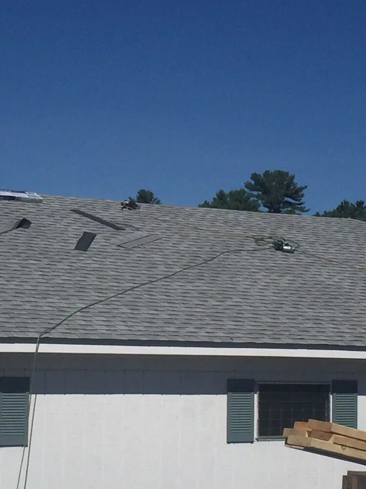 Slide of M & J Roofing