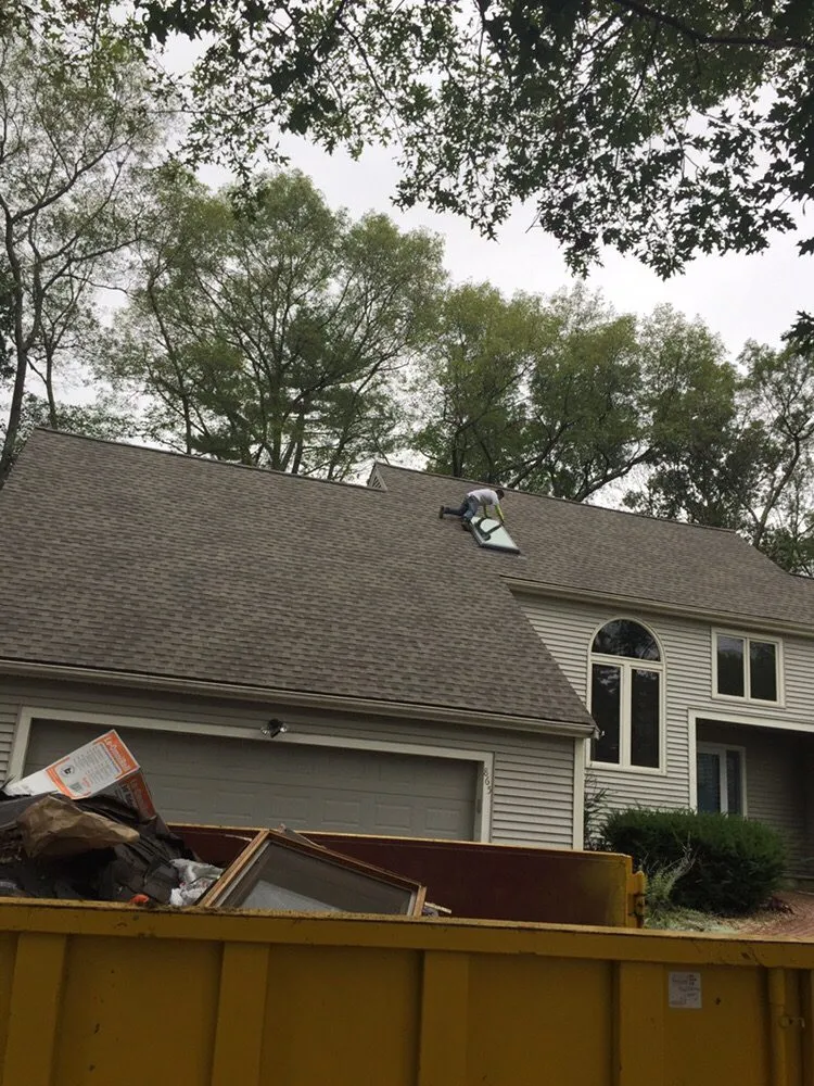 Slide of M & J Roofing