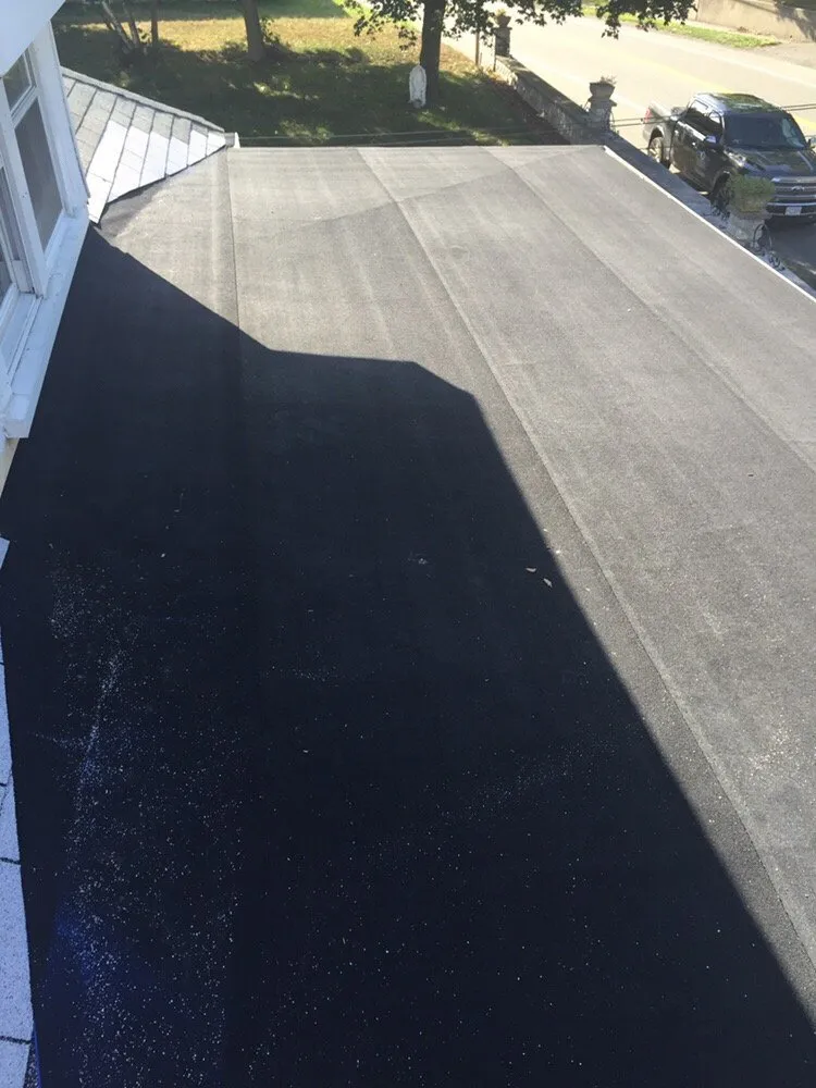 Slide of M & J Roofing