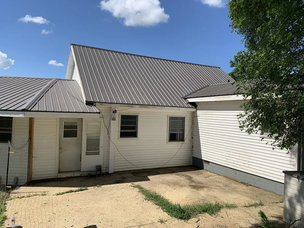 Emergency roof installation for residential properties in Lorimor, IA by M & M Roofing and Coatings