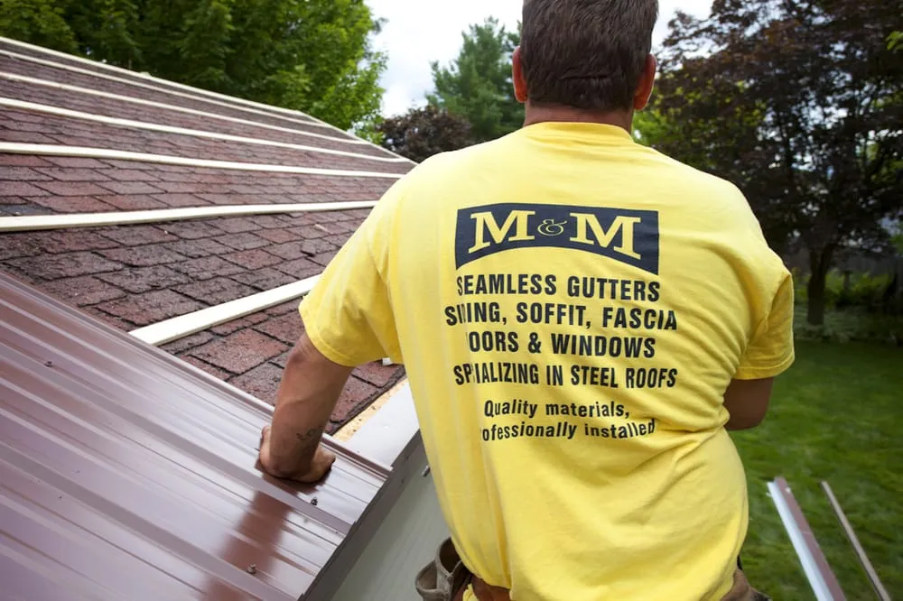 Slide of M & M Seamless Gutters