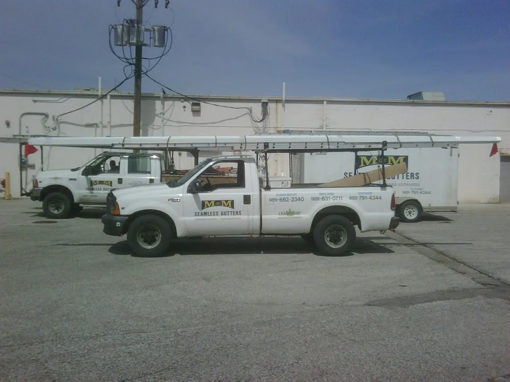 Slide of M & M Seamless Gutters