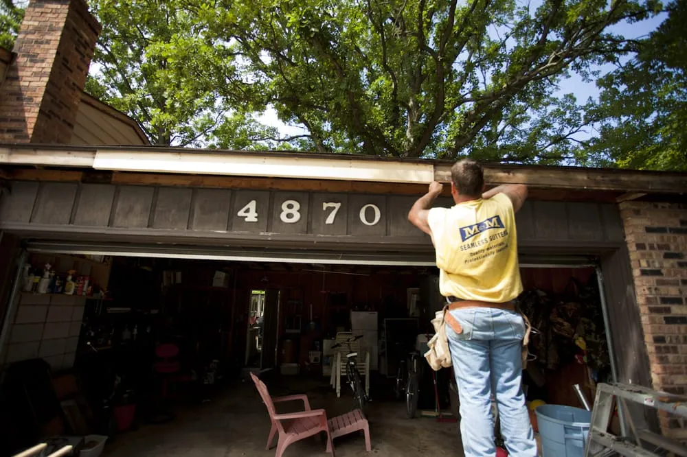 Slide of M & M Seamless Gutters