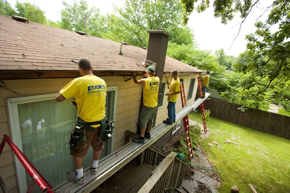 Slide of M & M Seamless Gutters