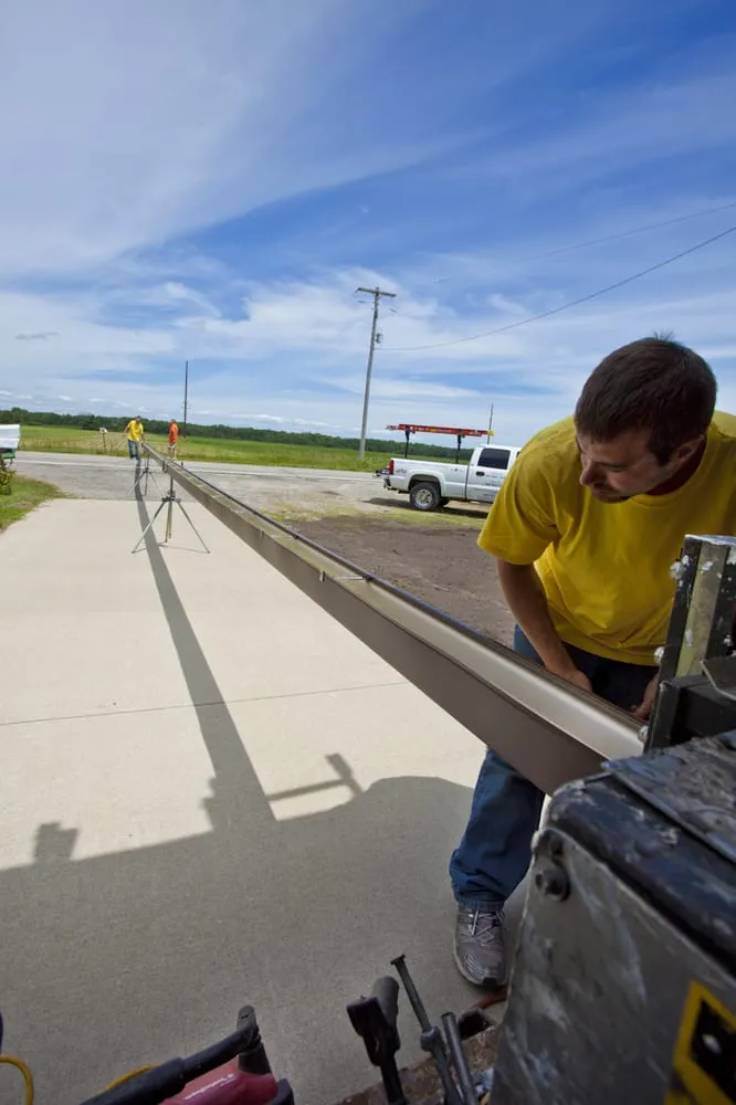 Slide of M & M Seamless Gutters