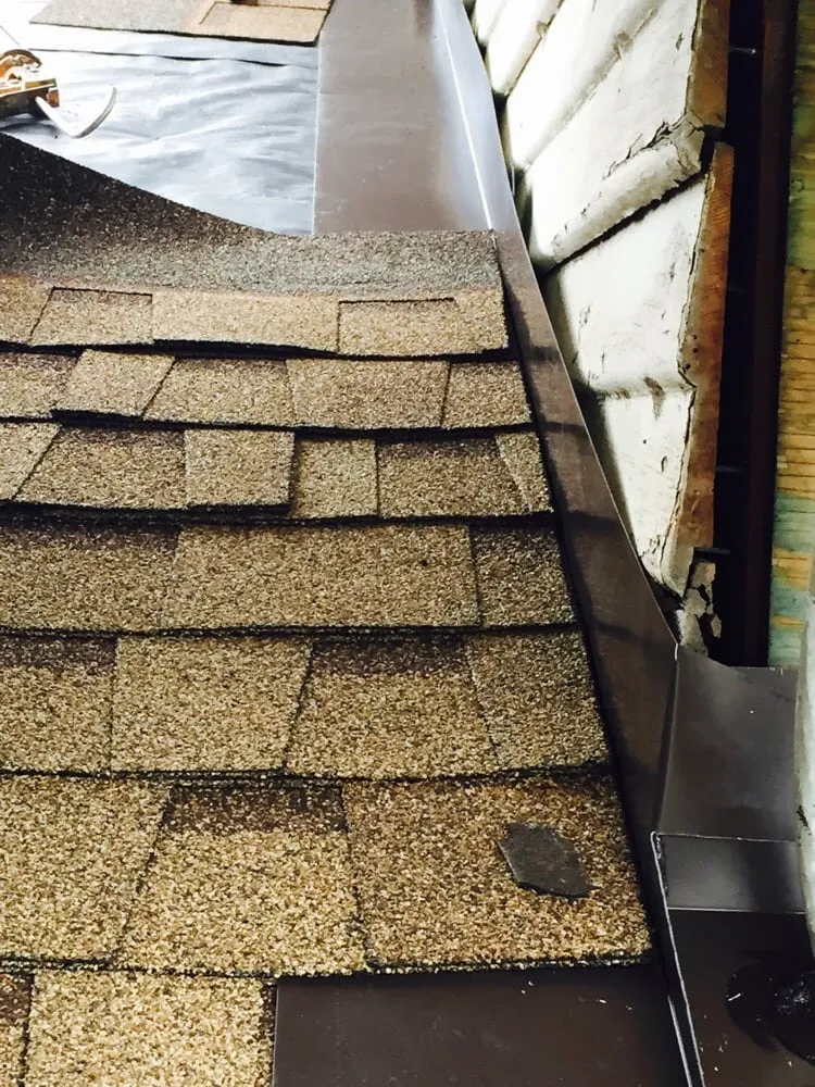 Slide of M & R Roofing