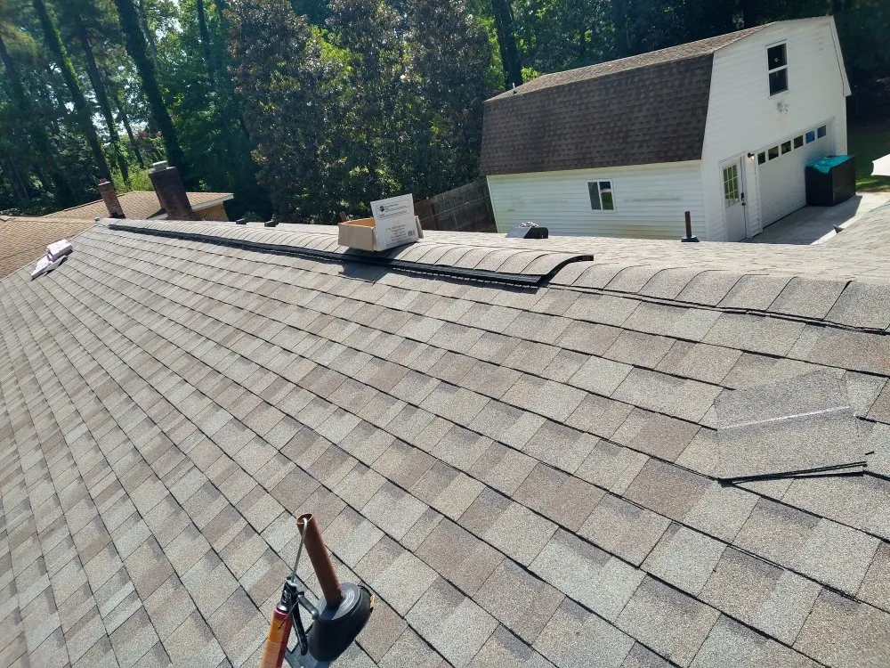 Slide of M & R Roofing Repair