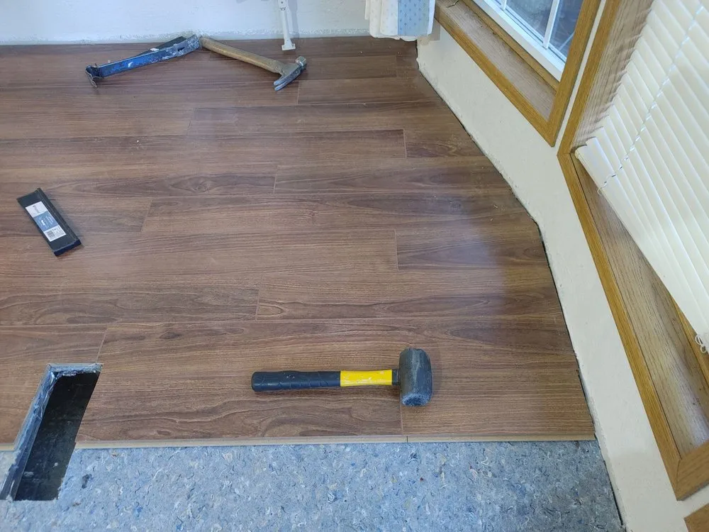 Slide of M and J's Roofing