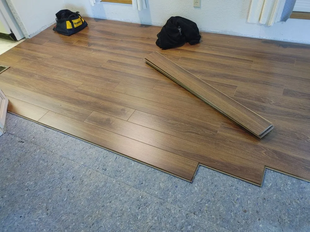 Slide of M and J's Roofing