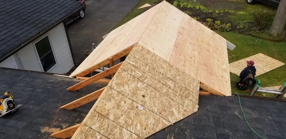 Slide of M and J's Roofing