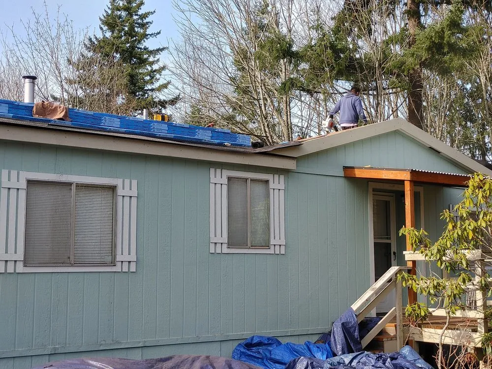 Slide of M and J's Roofing