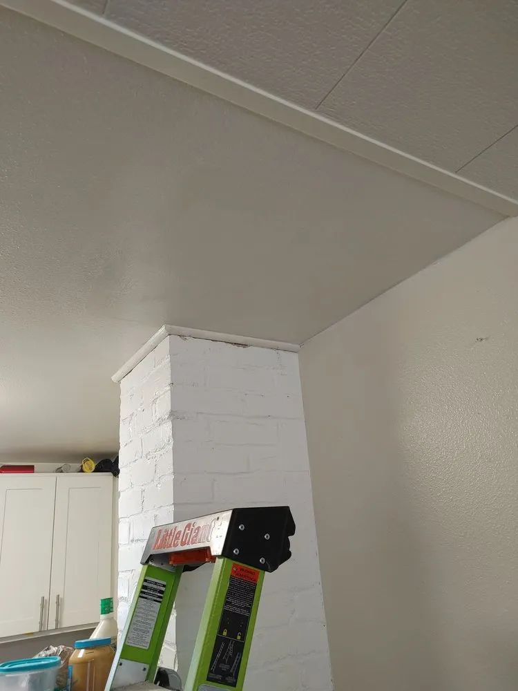 Slide of M and J's Roofing