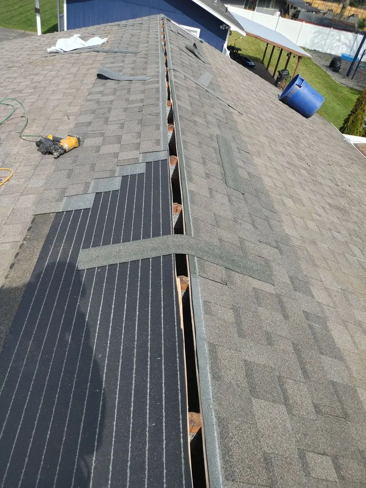 Slide of M and J's Roofing