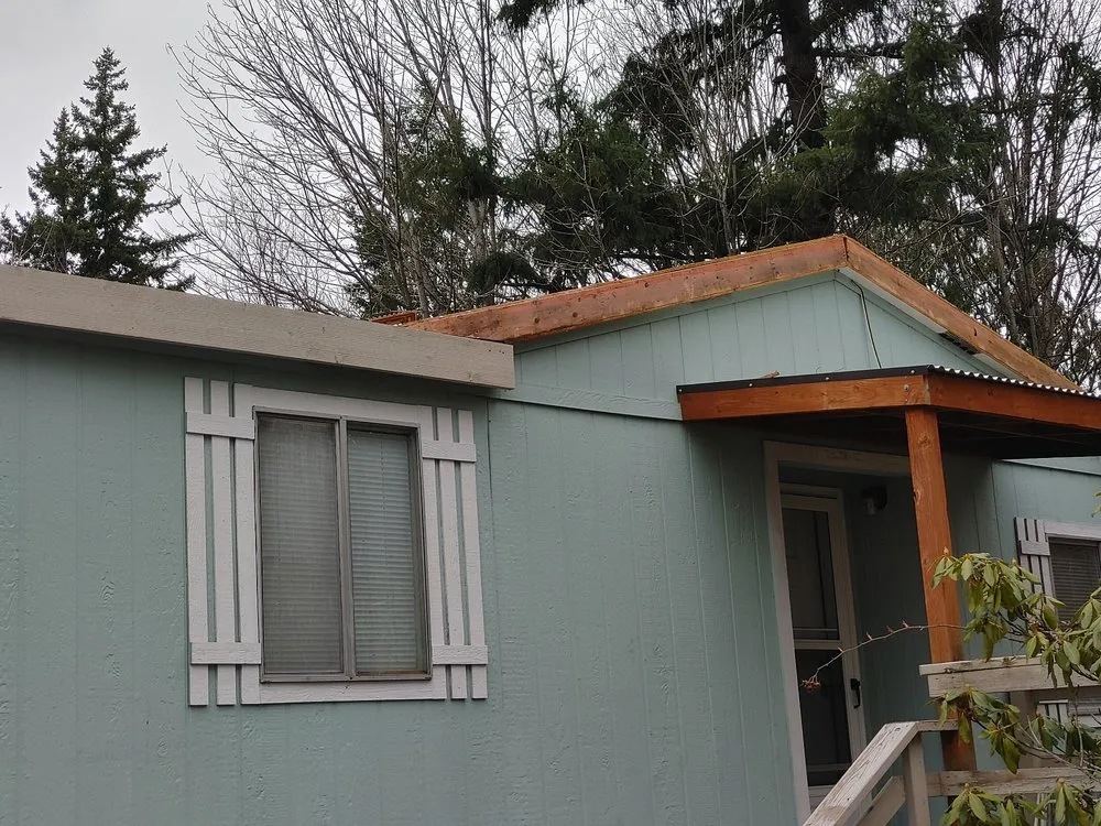 Slide of M and J's Roofing