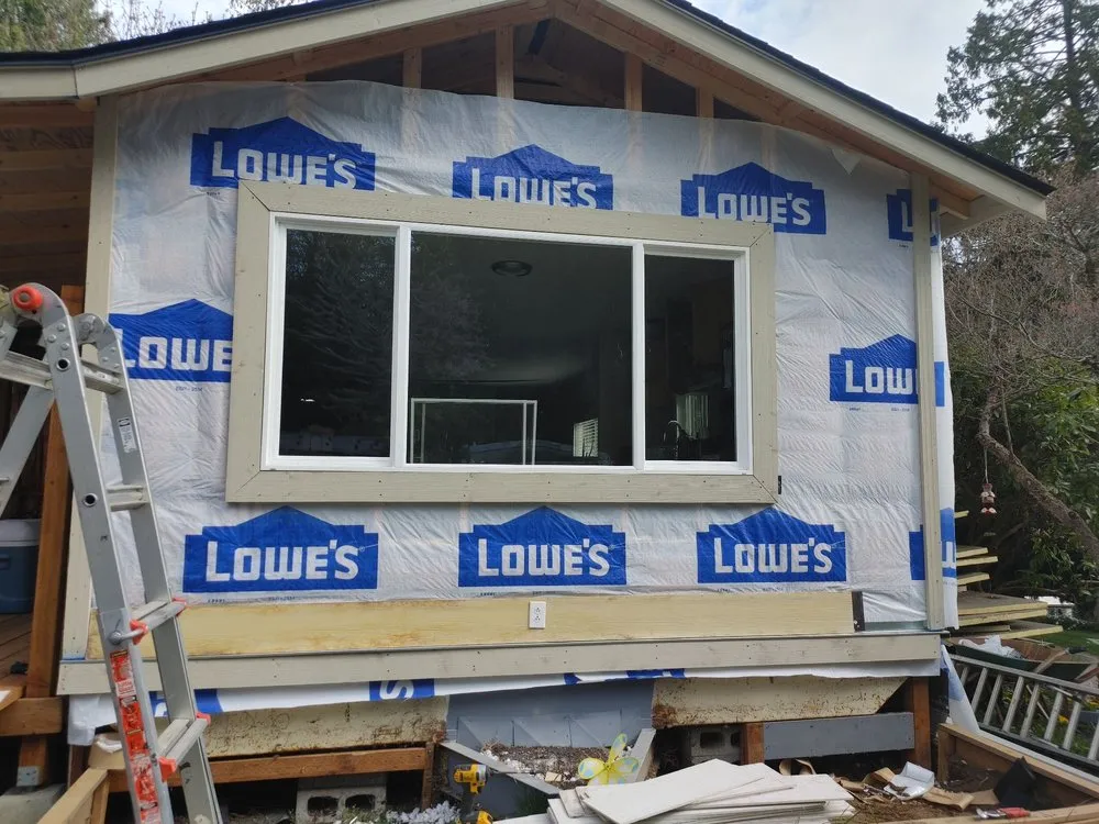 Slide of M and J's Roofing