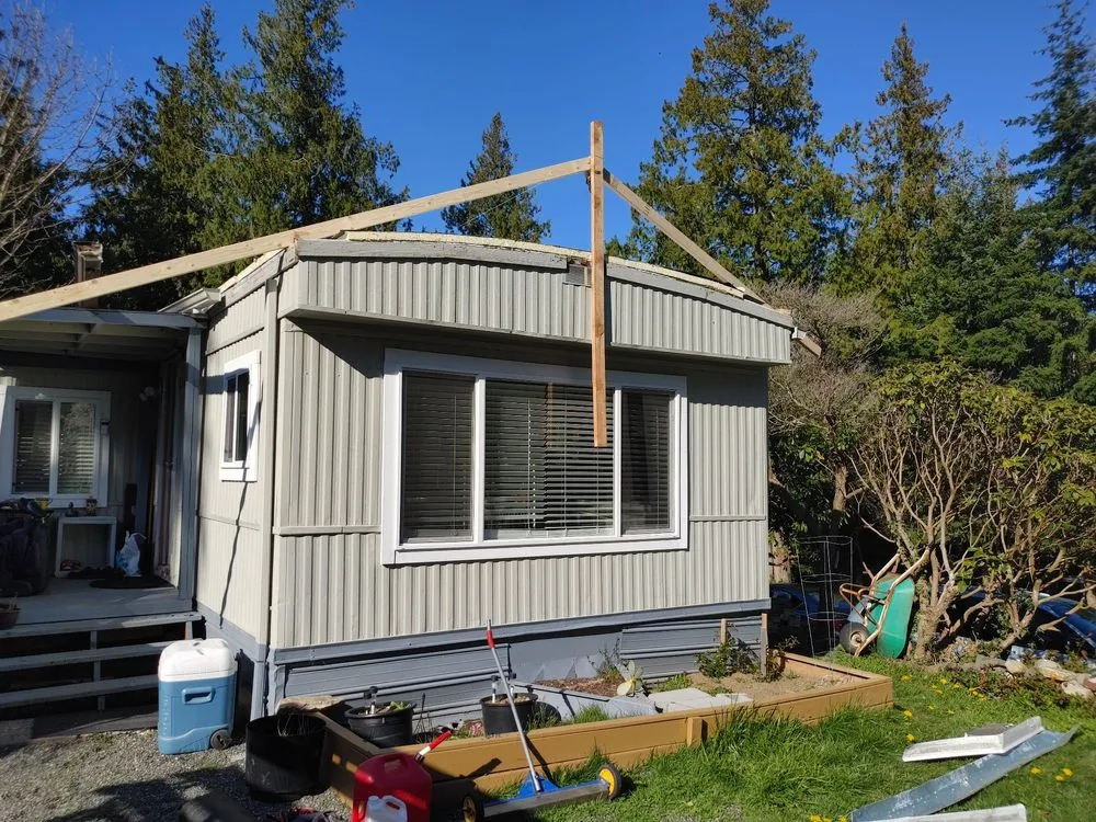 Slide of M and J's Roofing